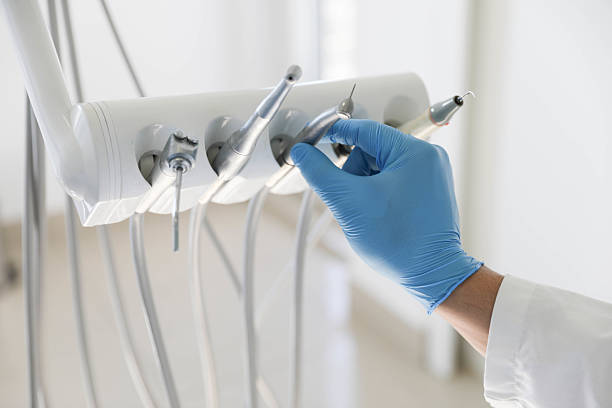 Professional Invisalign Clear Aligners technician working in Saranac Lake, NY